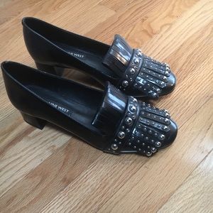 Black patent leather pumps